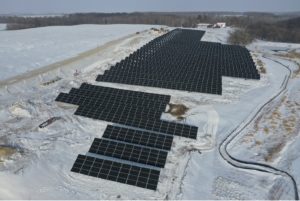 Minnesota Community Solar Aerial solar panels in snow